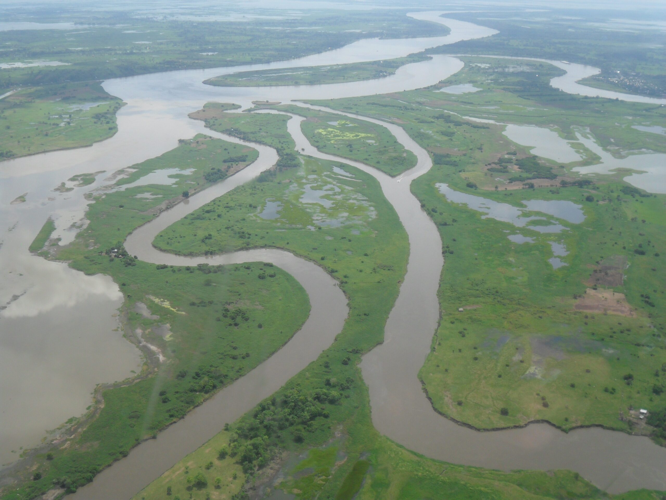 Photographs and scheme of geomorphic features: A, steep-sided wash bank