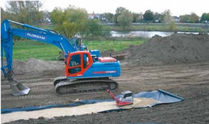 Digging a clay layer into a foreshore